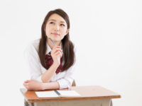 Schoolgirl sitting at a desk