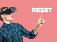 young-man-with-vr-headset-on-pink-background-picture-2