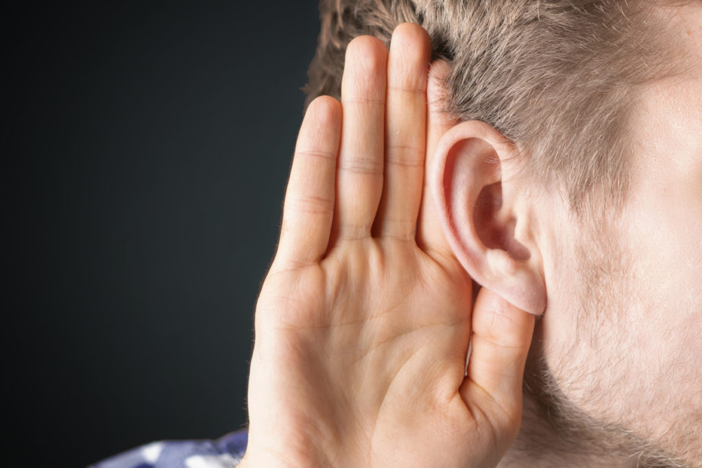close up photo of person have ear hearing problems isolated