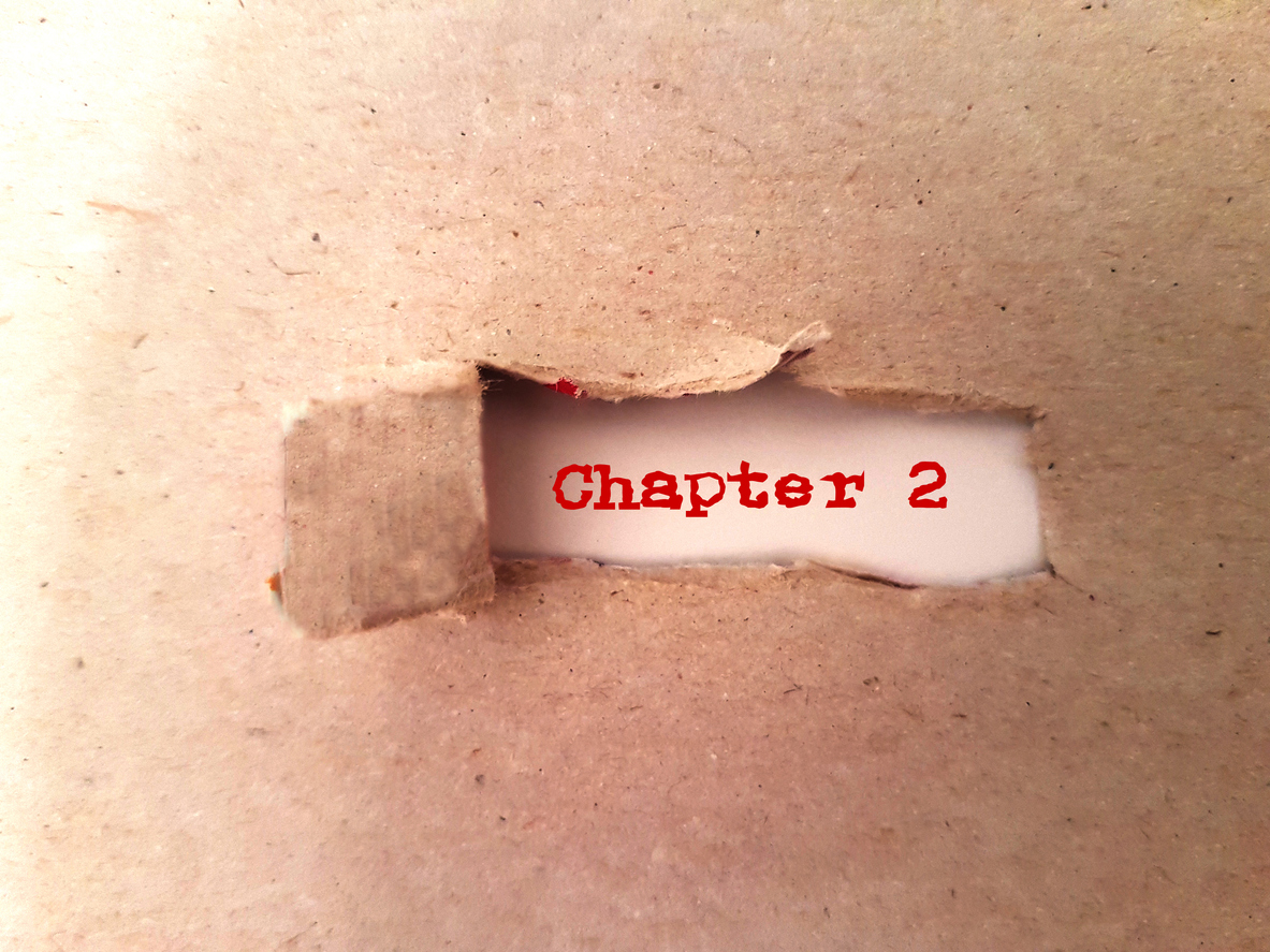 Text Chapter 2 - two appearing behind torn paper